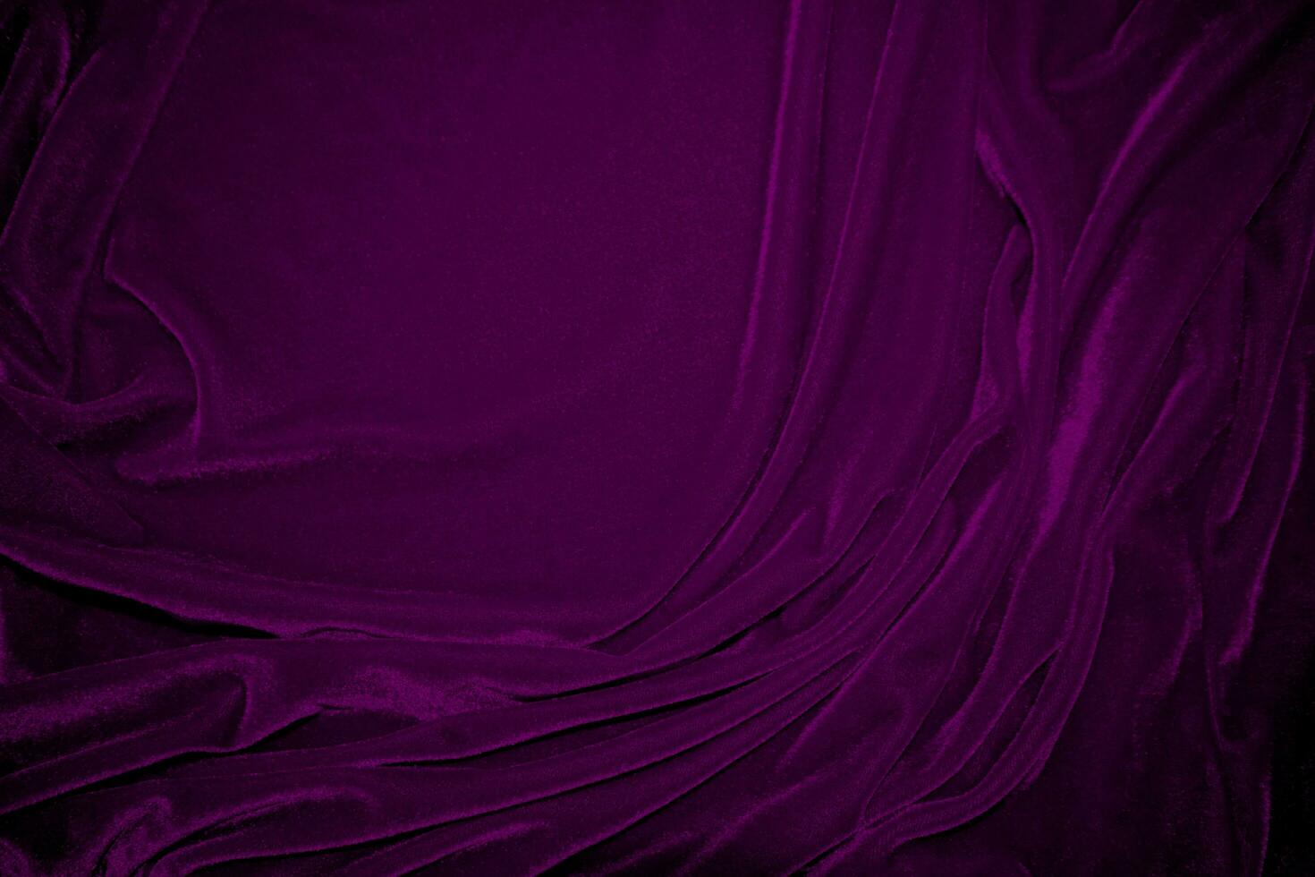 Pink velvet fabric texture used as background. Wine color panne fabric background of soft and smooth textile material. crushed velvet .luxury magenta tone for silk. photo