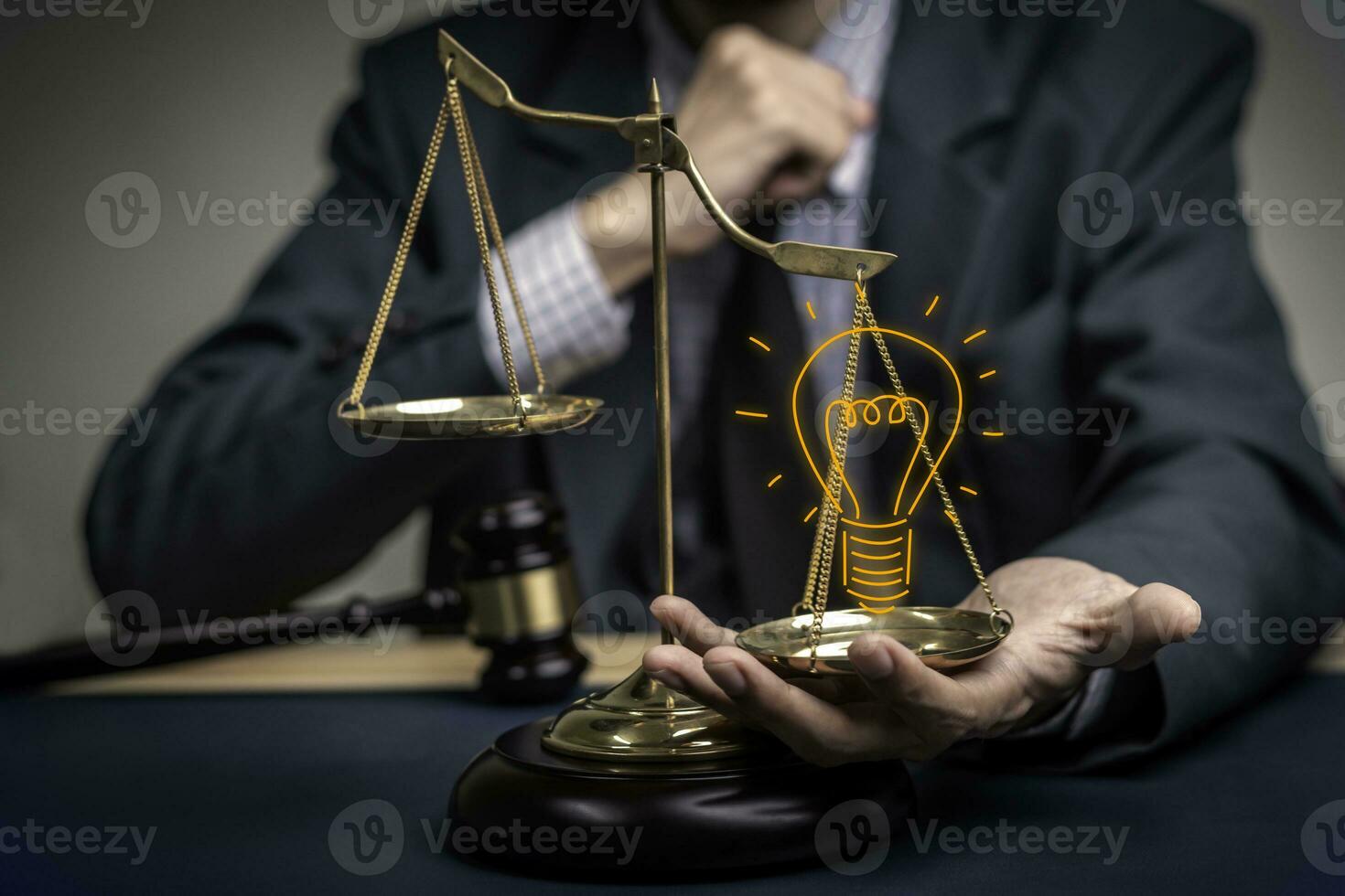 Lawyer's hand concept Justice with Judge gavel, Businessman in suit or Hiring lawyers in the digital system. Legal law, prosecution, legal adviser, lawsuit, detective, investigation,legal consultant. photo