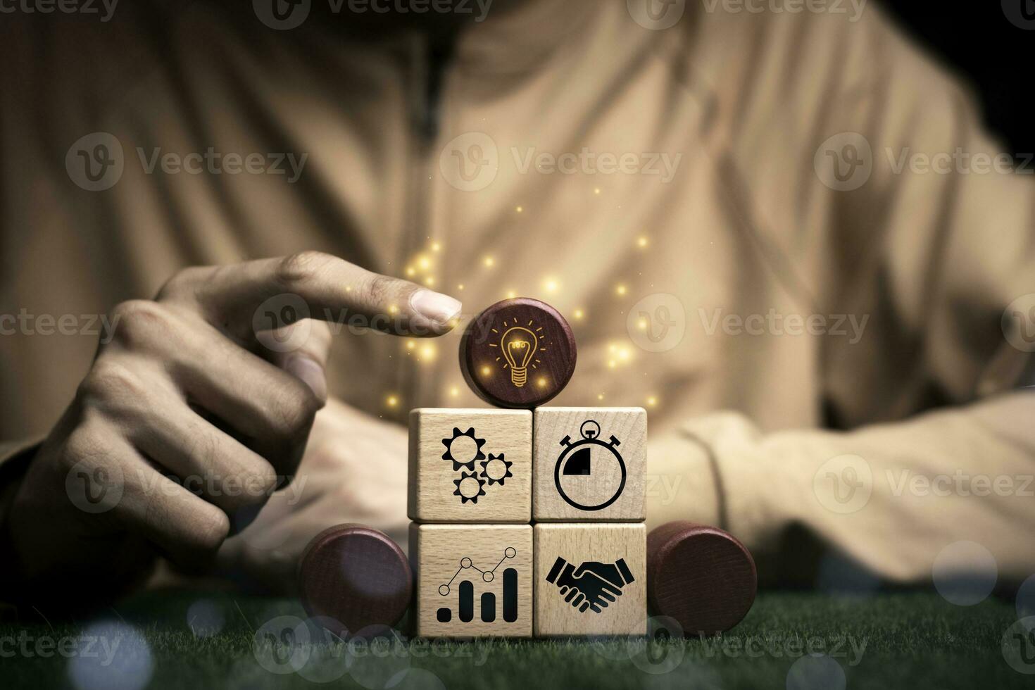 Businessman holding woods block cube with icon success of busines. purpose of doing business overcoming challenges Walking towards goals and winning. Sustainable business finance action plan photo