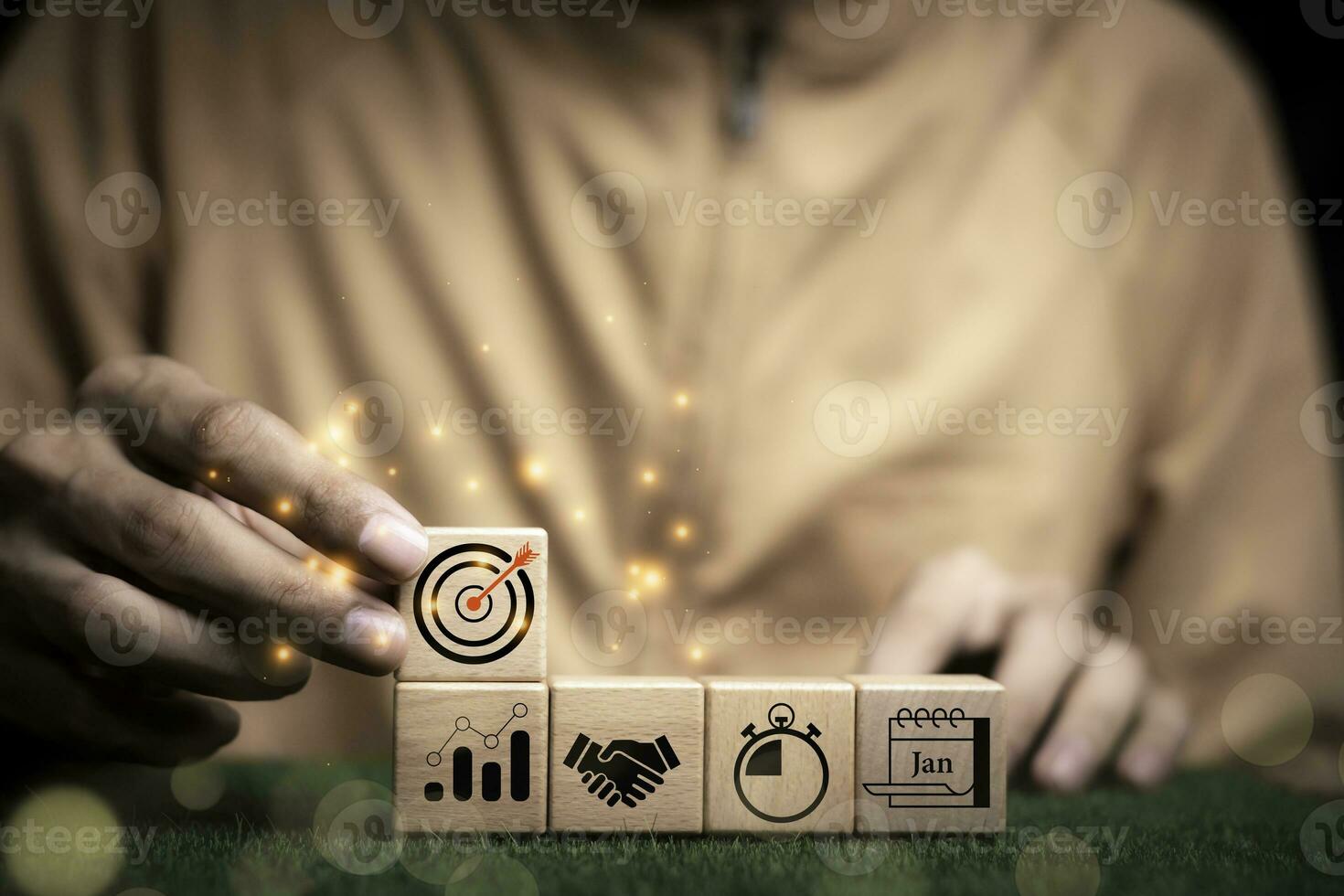 Businessman holding woods block cube with icon success of busines. purpose of doing business overcoming challenges Walking towards goals and winning. Sustainable business finance action plan photo