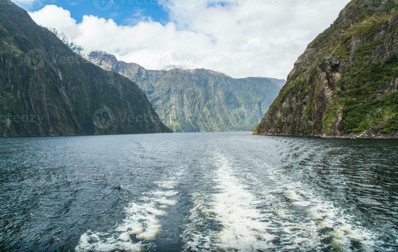 Scenery view of Milford Sound, New Zealand's most spectacular natural attraction in south island of New Zealand view from tour boat. photo