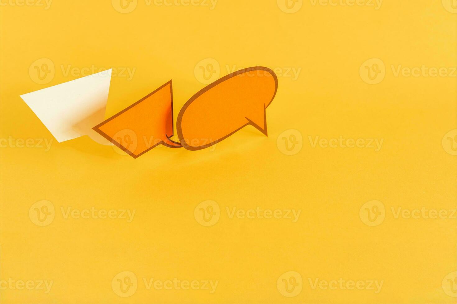 Three paper speech bubbles on yellow background. photo