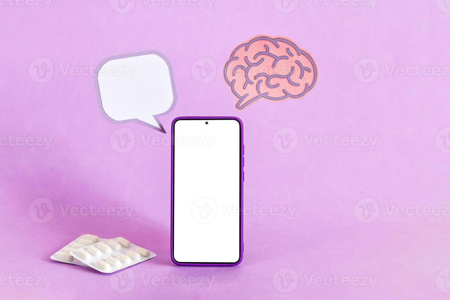 Brain paper cutout and smart phone. Epilepsy and alzheimer awareness, seizure disorder, mental health concept. photo