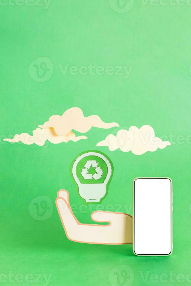Green leaf light lamp bulb save energy paper cut icon. Save the planet. photo