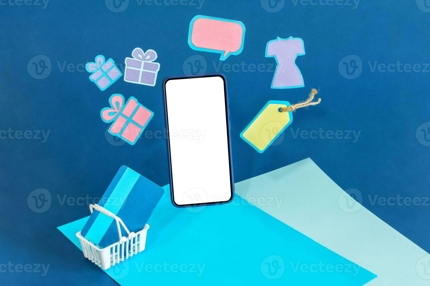 Online shopping on smart phone concept, floating shopping items, online buying, and online payment. photo