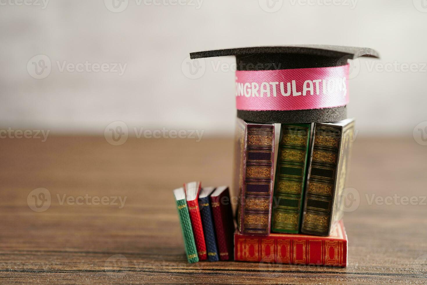 Graduation hat on book with copy space, learning university education concept. photo