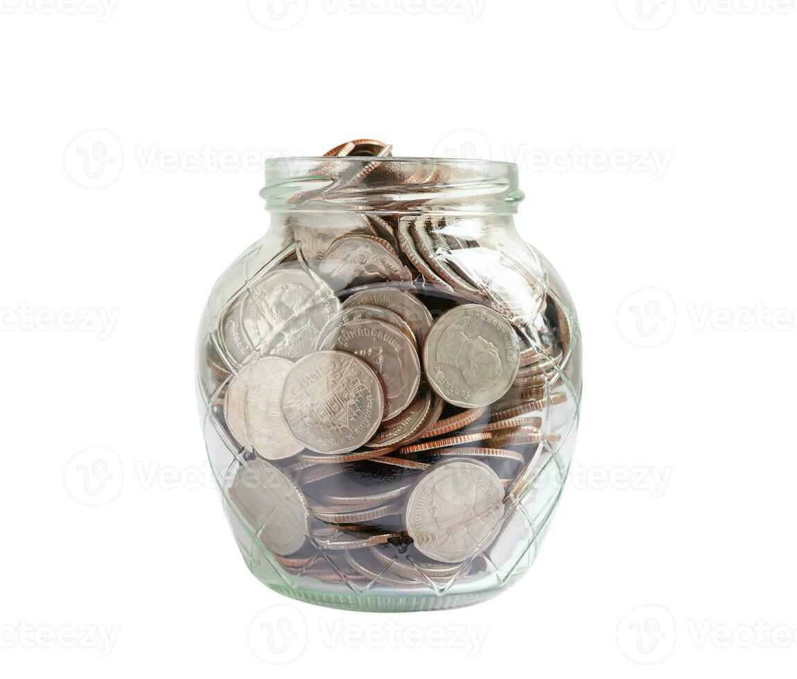 Coins in glass jar isolated on white background with clipping path, Business finance saving money banking investment concept. photo