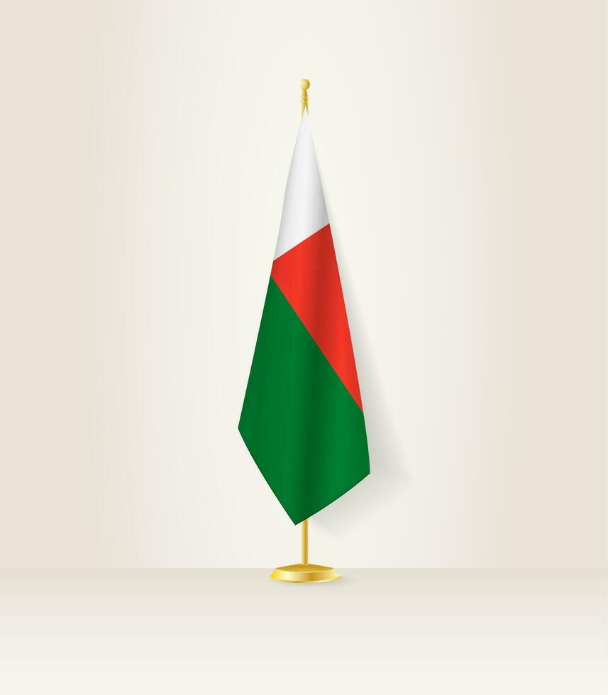 Madagascar flag on a flag stand. vector