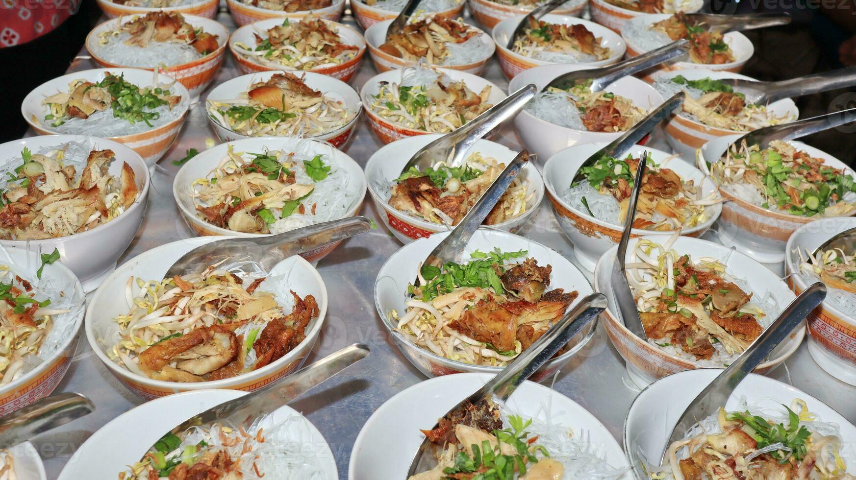 Close up of several bowls of Soto photo