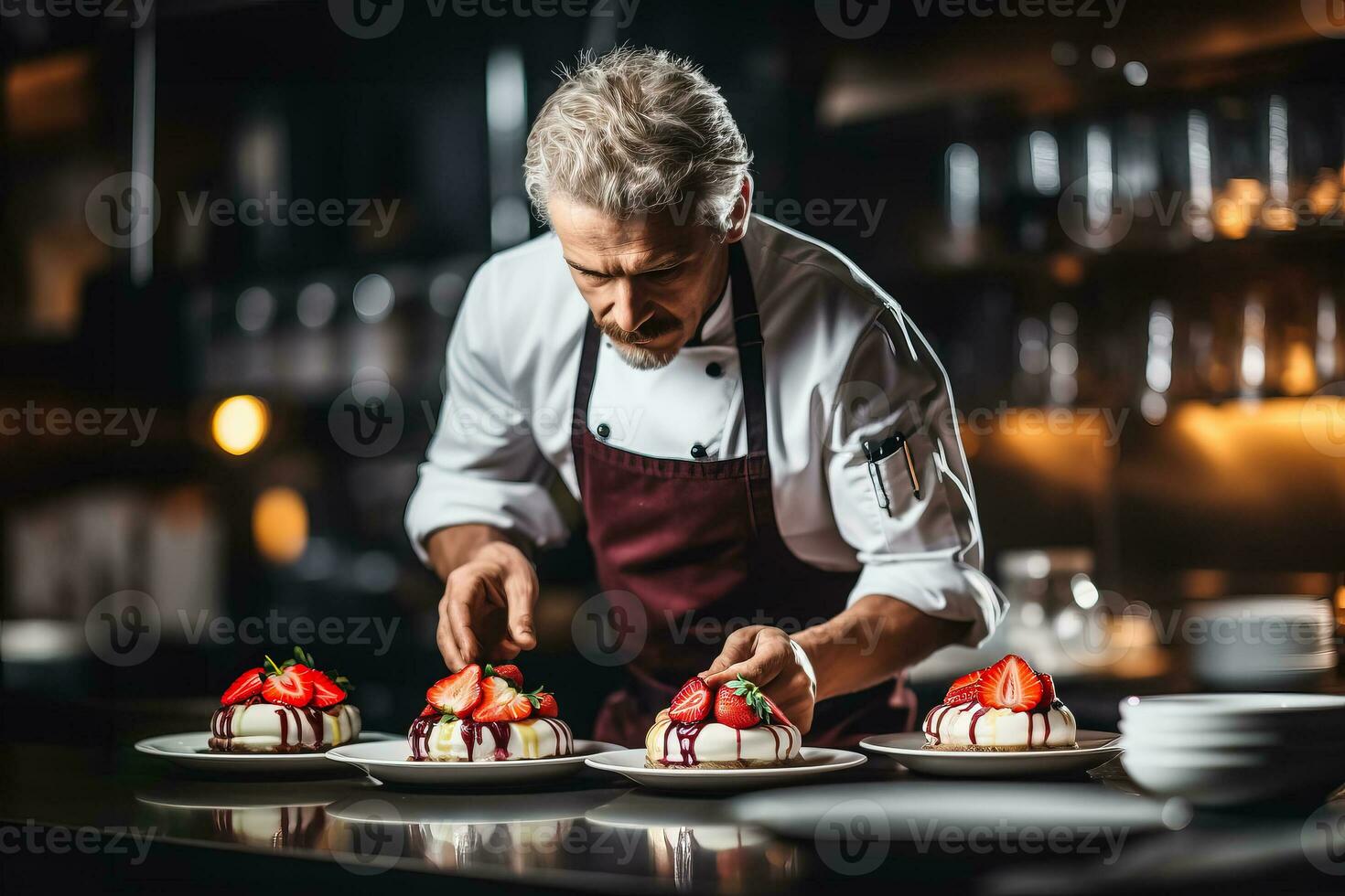 Male chef plating a gourmet dessert in a modern bistro photo