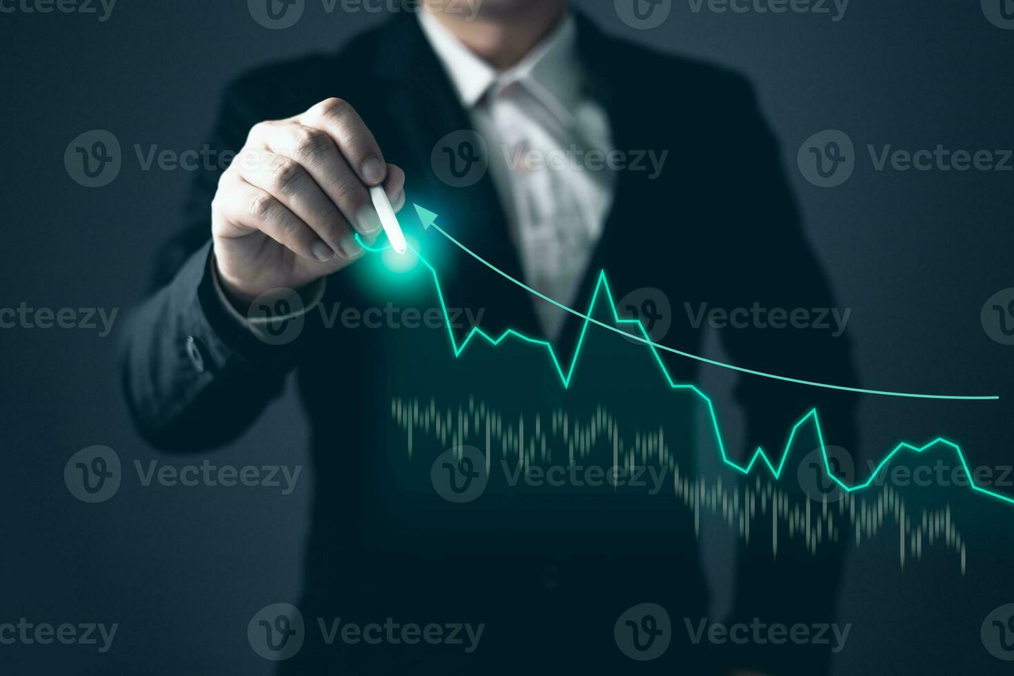 man draw graphs and progress of business and analyze financial,and investment.Use technology to plan strategy to success goals and growth stock.online business,e-commerce,online marketing. photo