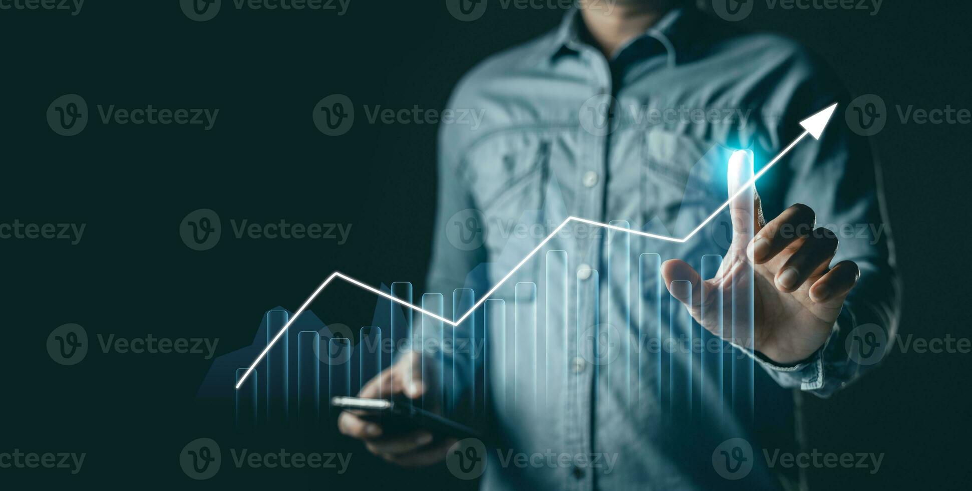 man draw graphs and progress of business and analyze financial,and investment.Use technology to plan strategy to success goals and growth stock.online business,e-commerce,online marketing. photo