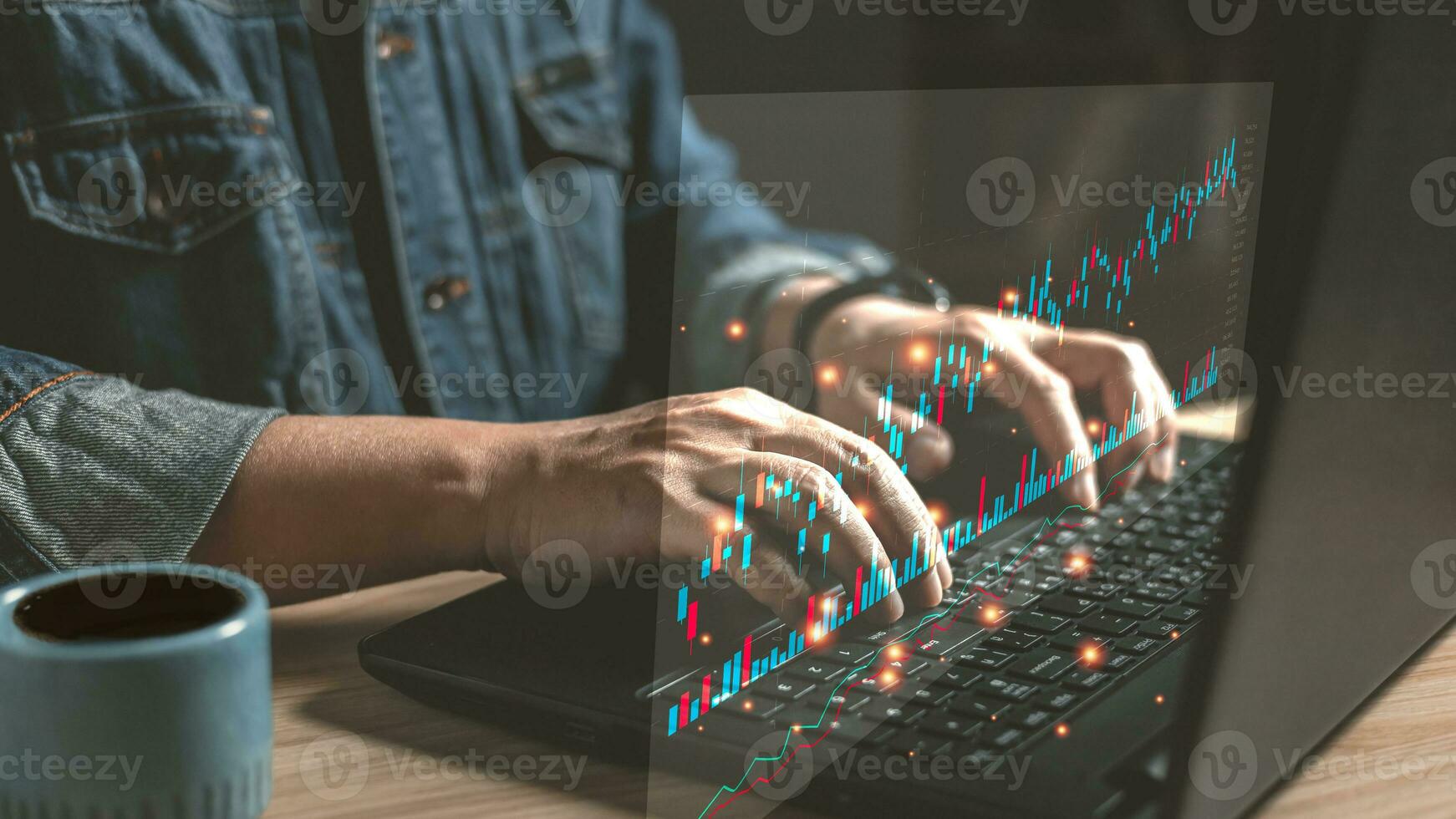 man use laptop graphs and business progress and analyze financial and investment. Use technology to plan a strategy to success goals and growth stock,online business, economic, online marketing. photo
