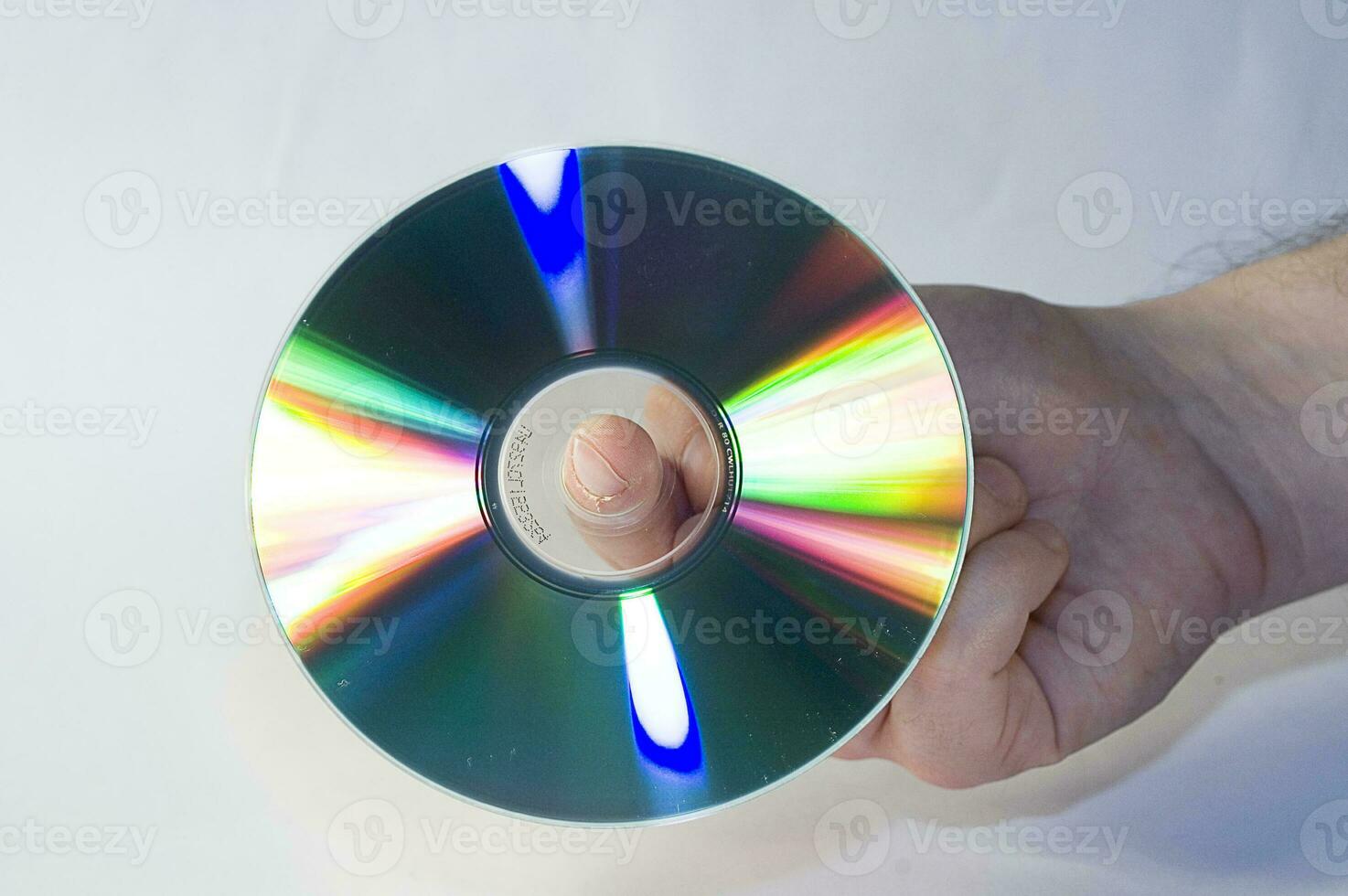 discos compactos disco en masculino mano en blanco antecedentes foto