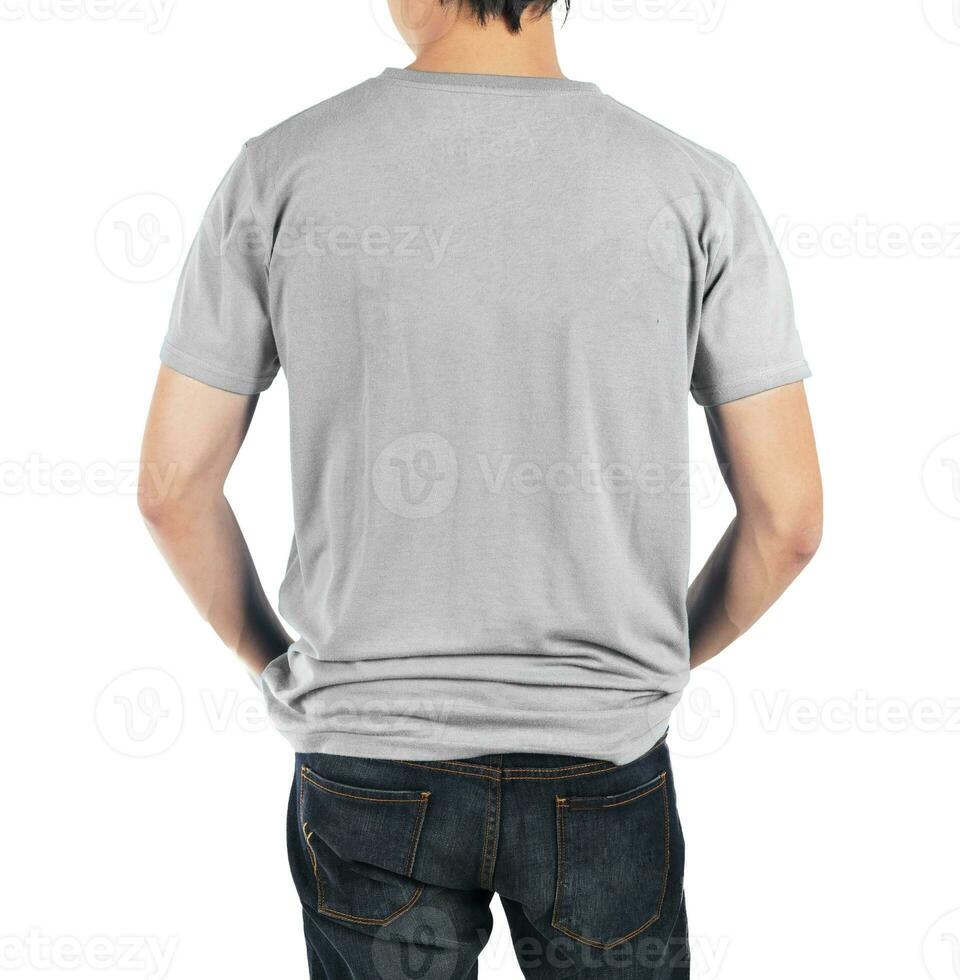 Close up of man in back light grey shirt on white background. photo