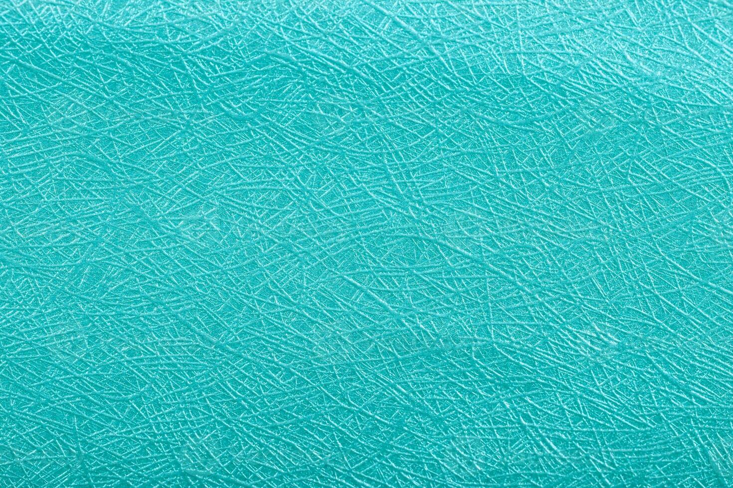 Blue ocean paper foil on background texture. photo
