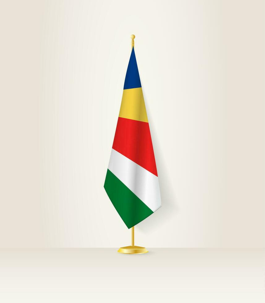 Seychelles flag on a flag stand. vector