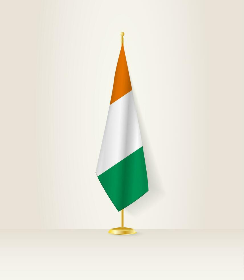 Ivory Coast flag on a flag stand. vector