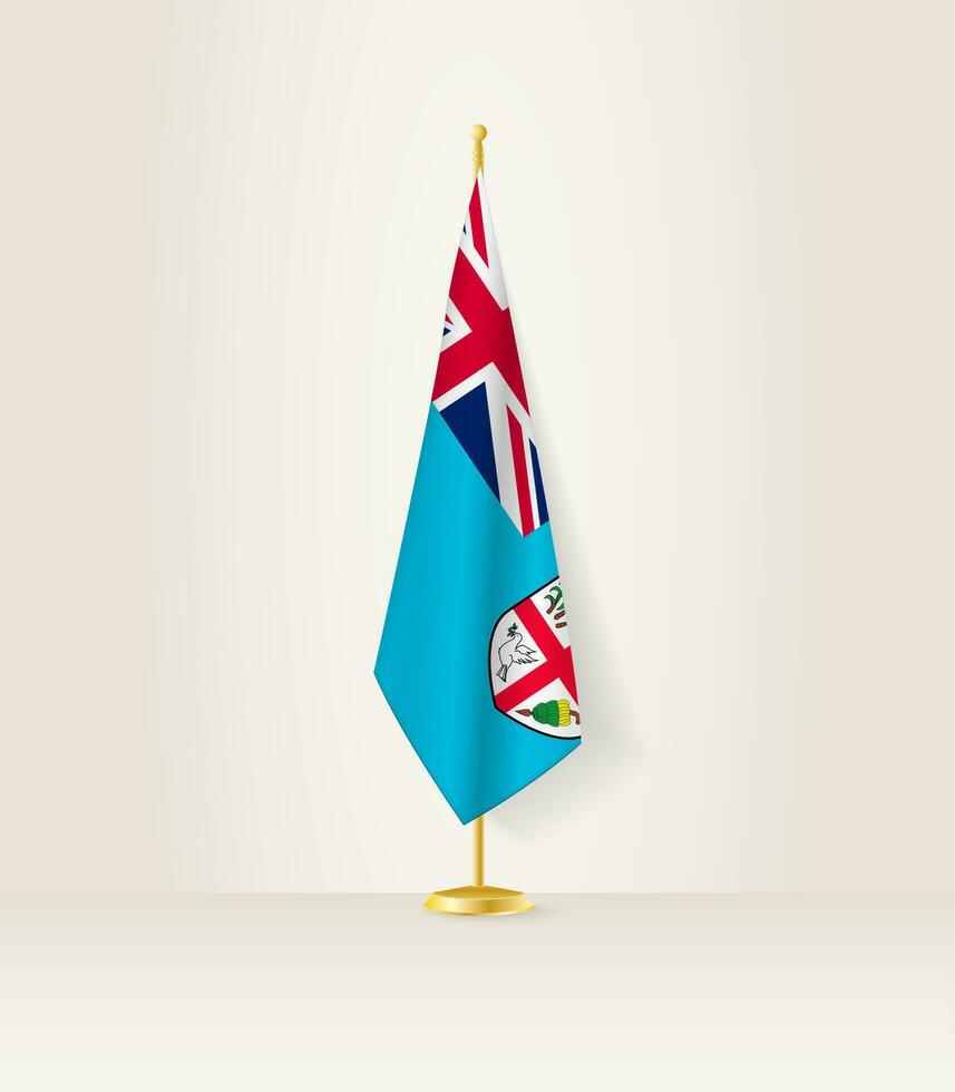 Fiji bandera en un bandera pararse. vector