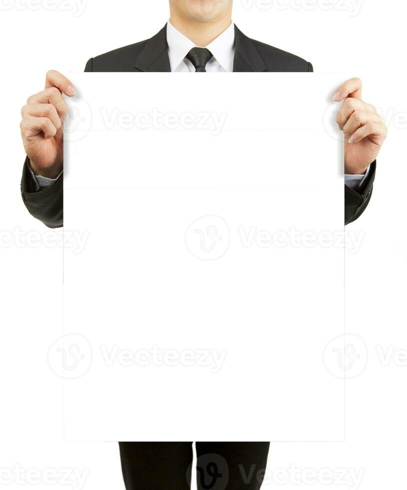 Business man holding blank paper isolated on white background. photo