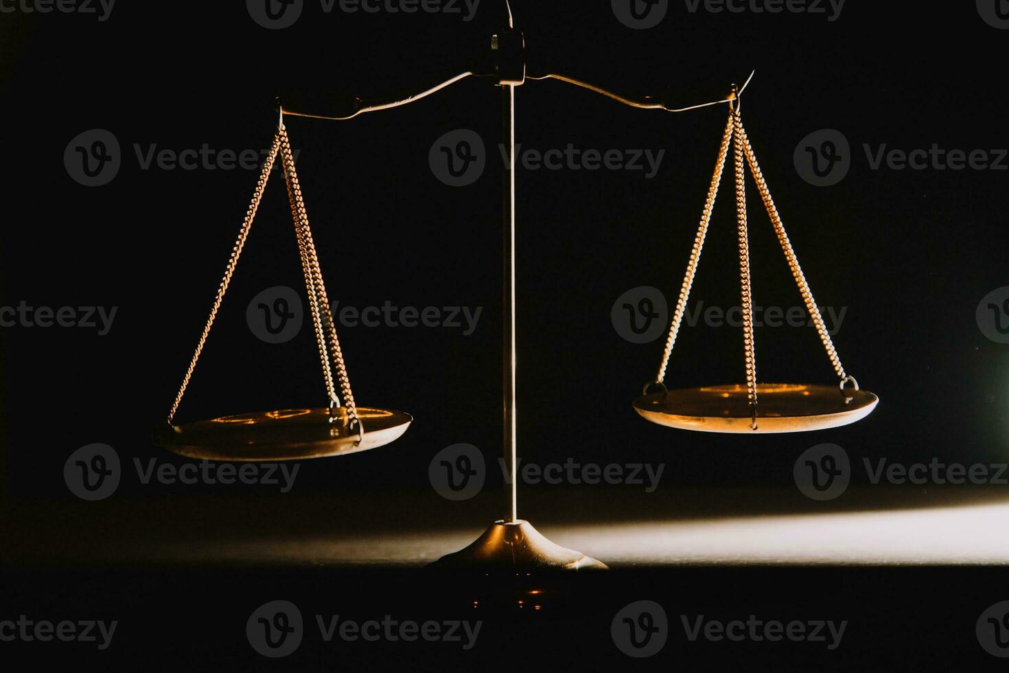 Business and lawyers discussing contract papers with brass scale on desk in office. Law, legal services, advice, justice and law concept picture with film grain effect photo