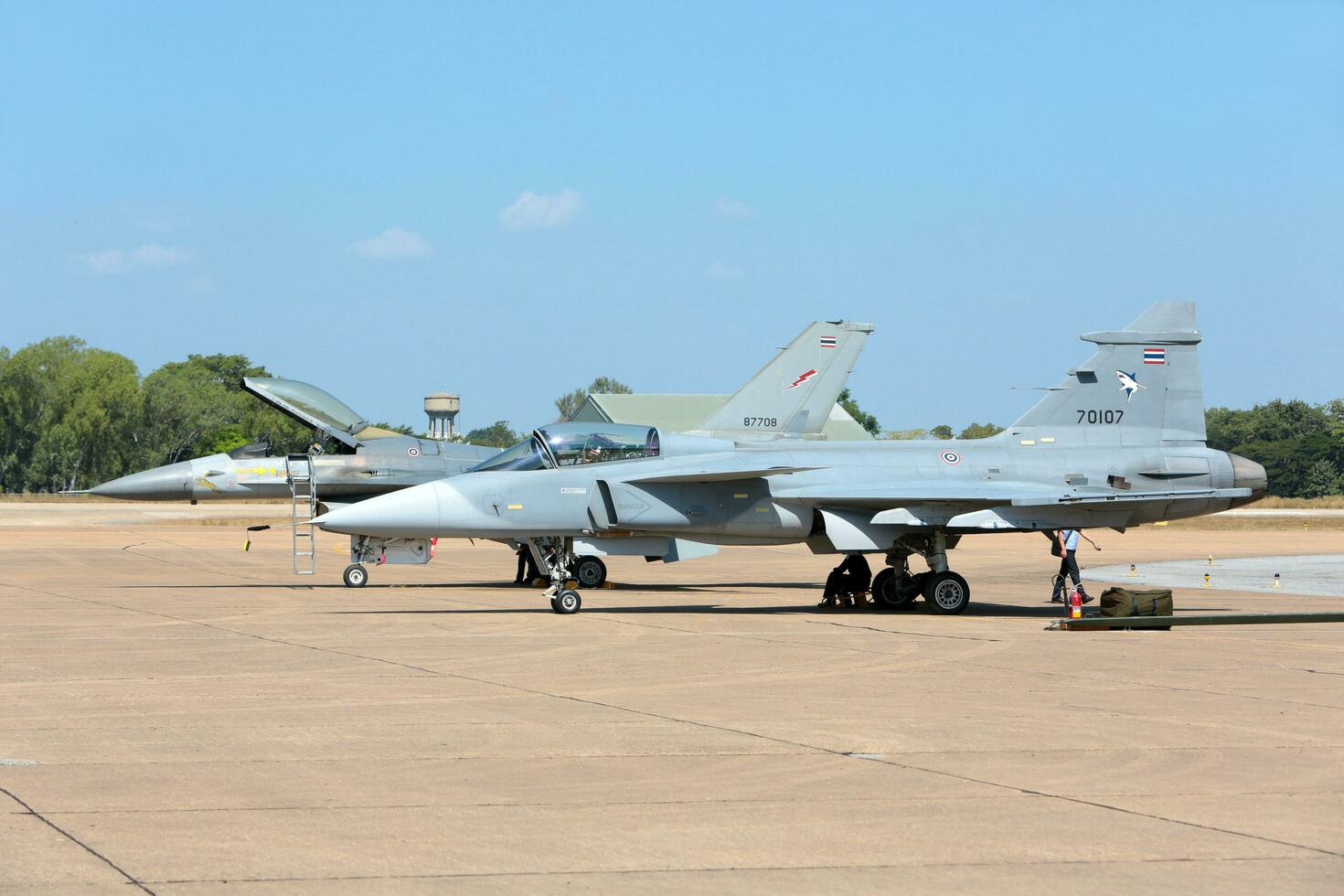 Nakhonratchasima, THAILAND November 27, 2015 - F16 Gripen and August 1st Aerobatic team engaged in acrobatics. photo