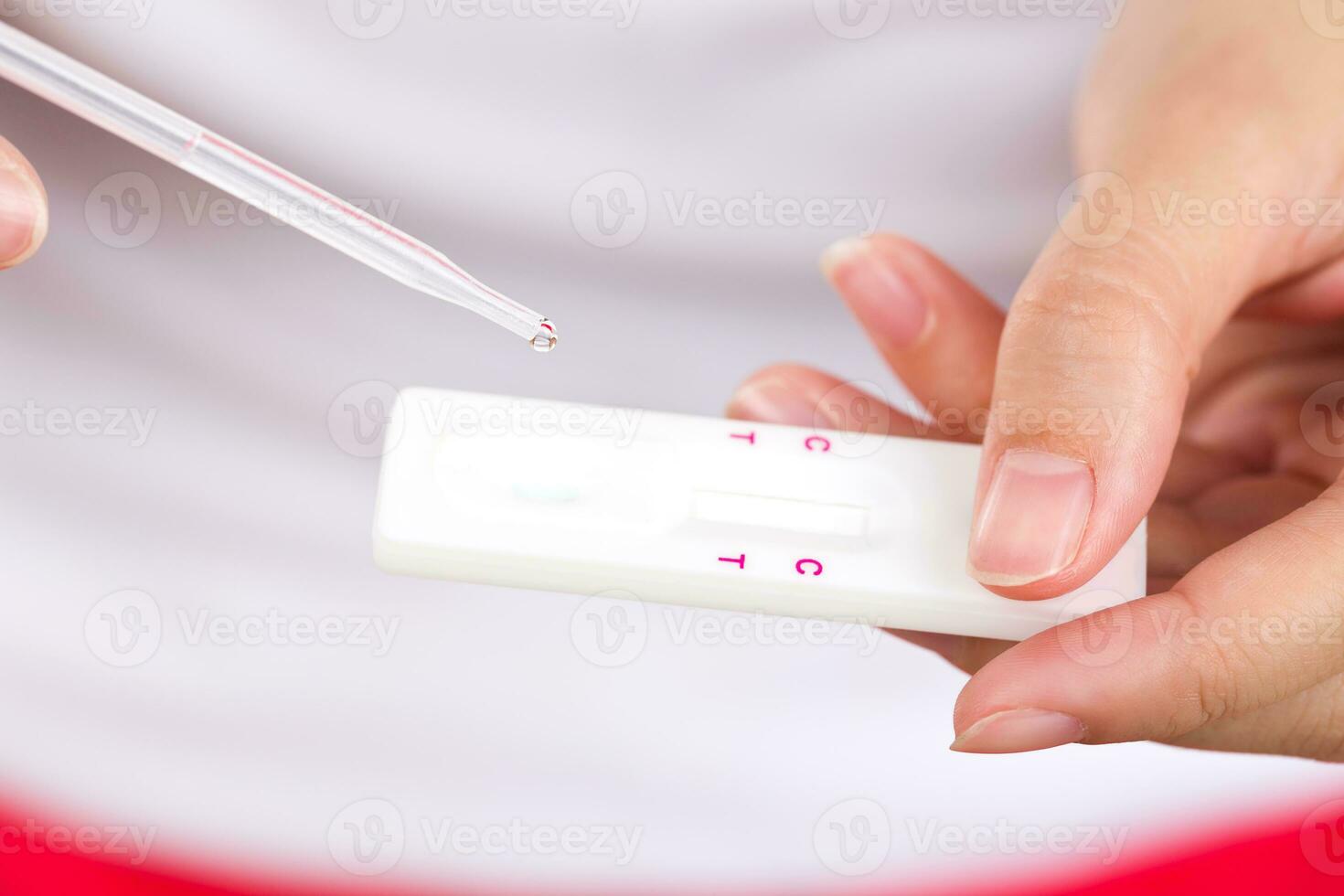 Young women checking pregnancy test. photo