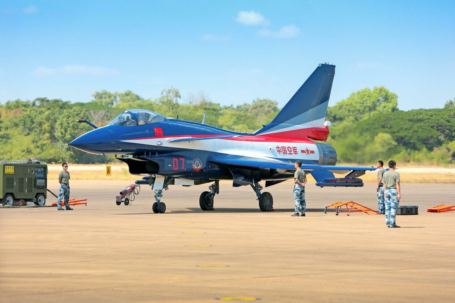 Nakhonratchasima, THAILAND November 27, 2015 - F16 Gripen and August 1st Aerobatic team engaged in acrobatics. photo