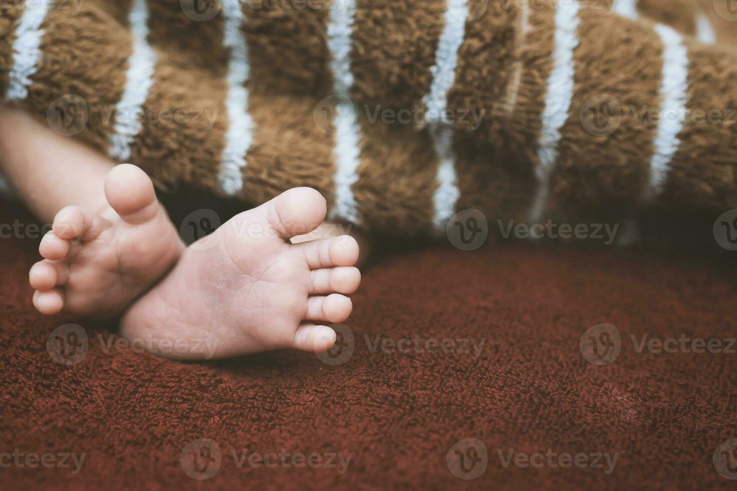 Vintage style of new born little baby feet. photo