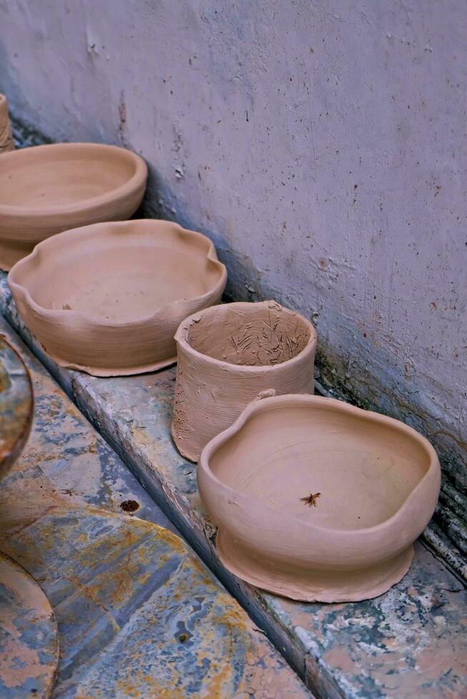 the activity of making handicrafts from clay or often called pottery class and some of the results photo