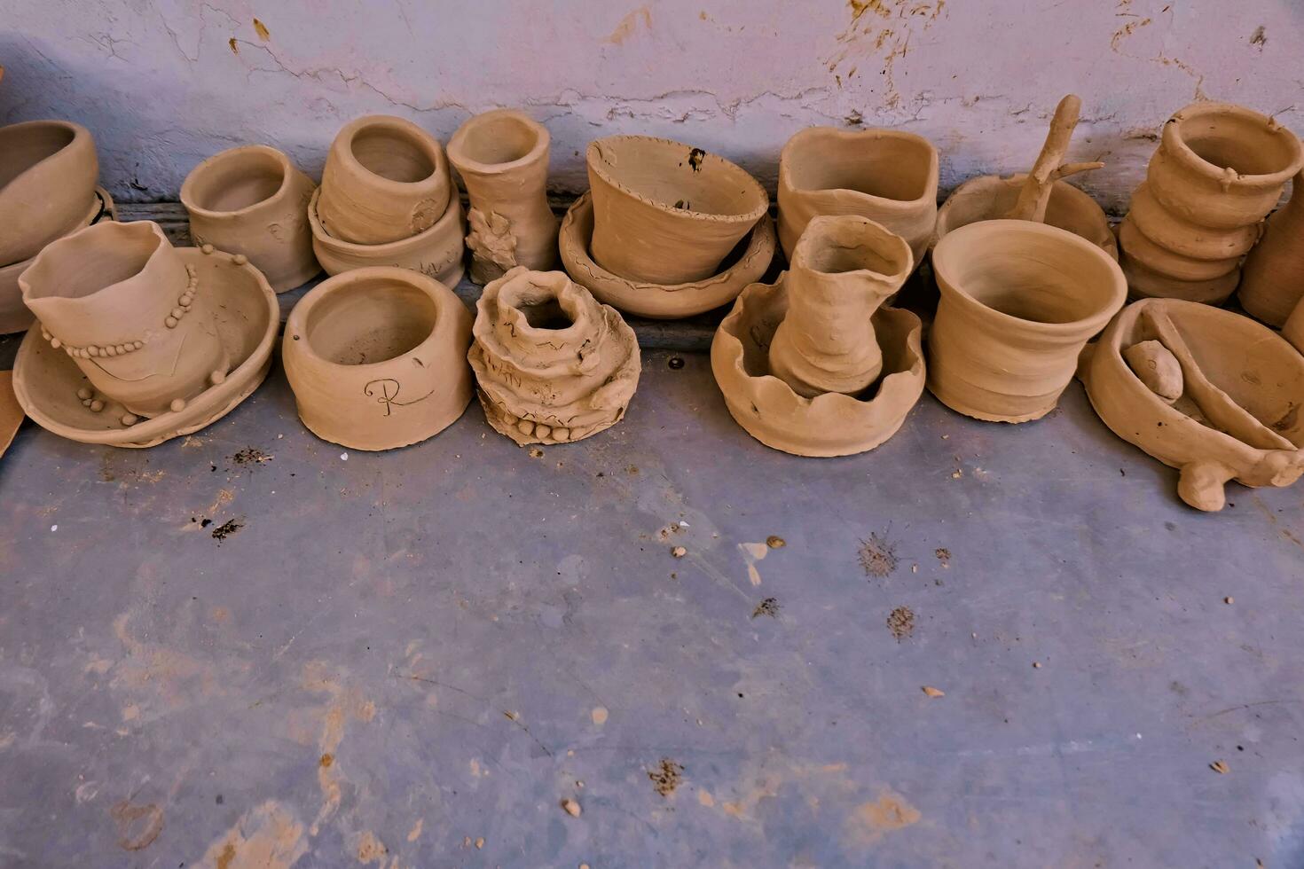 the activity of making handicrafts from clay or often called pottery class and some of the results photo