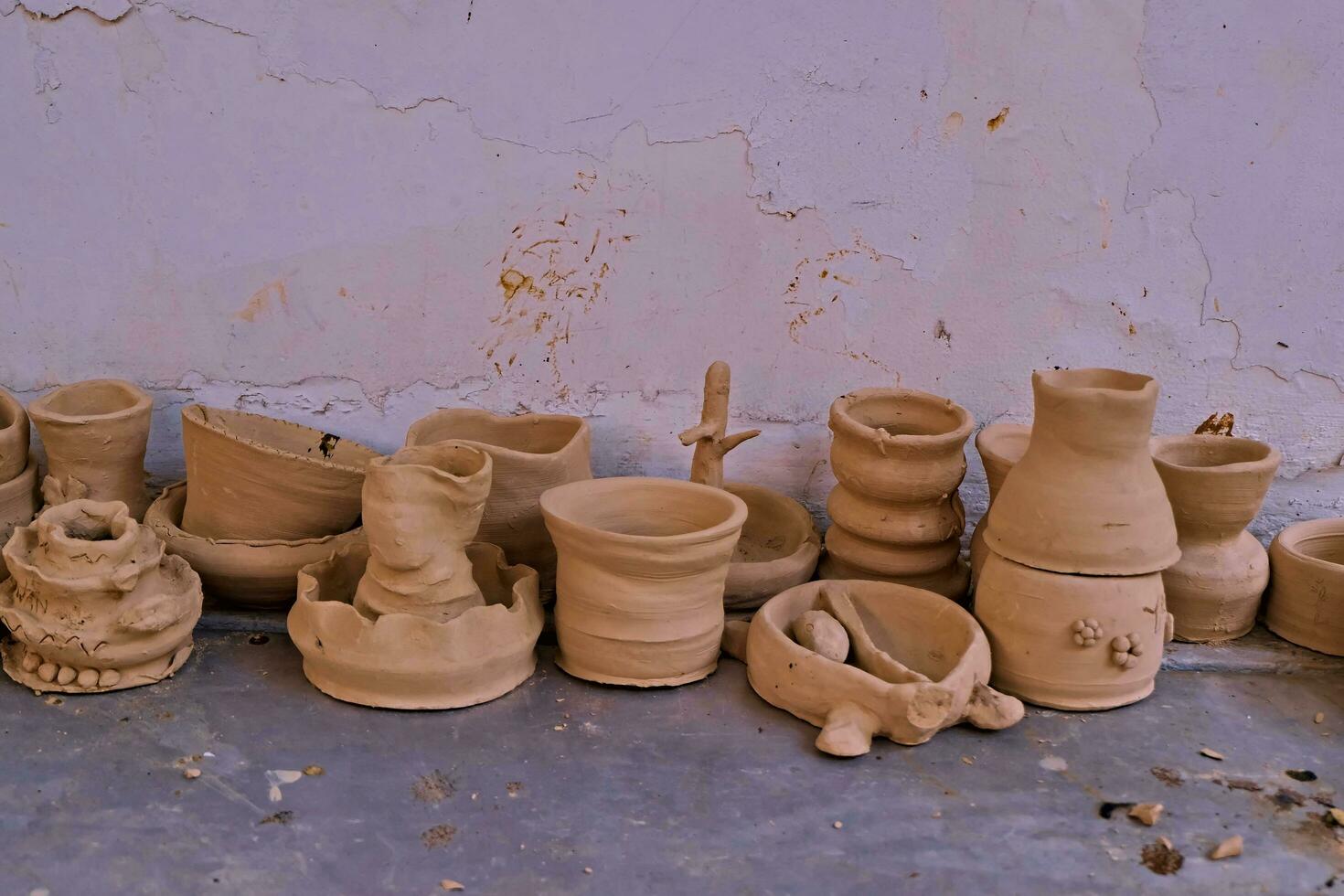 the activity of making handicrafts from clay or often called pottery class and some of the results photo