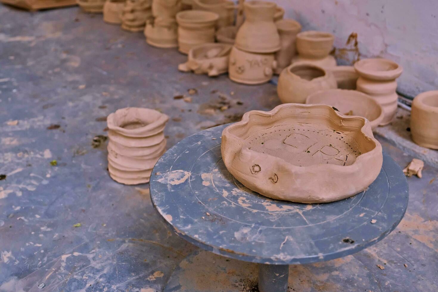 the activity of making handicrafts from clay or often called pottery class and some of the results photo