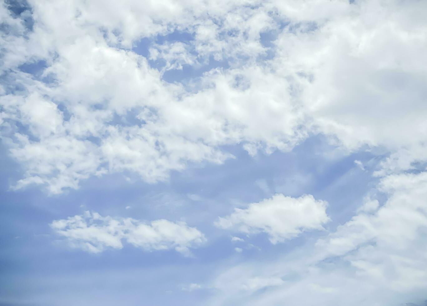 Sky and fluffy cloud scenery in the morning is incredibly calming to start the day,sky and fluffy white cloud made me feel relaxed,sky and fluffy cloud scenery take a majestic and breathtaking beauty photo