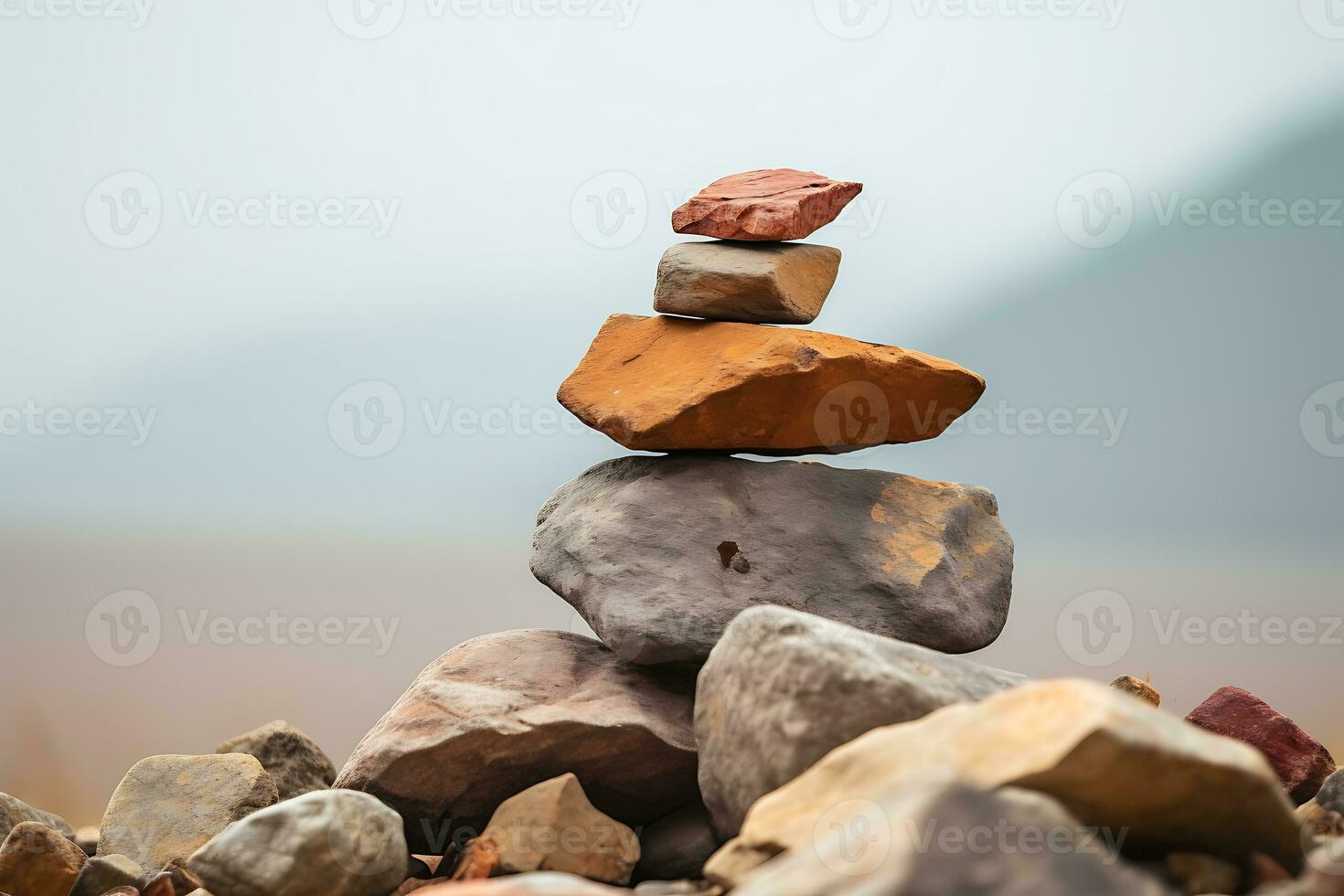 Stack of balanced rocks around pile of rocks. AI Generated. photo