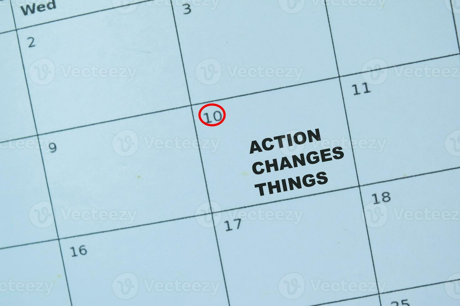Concept of Date on a calendar with text Action Changes Things photo