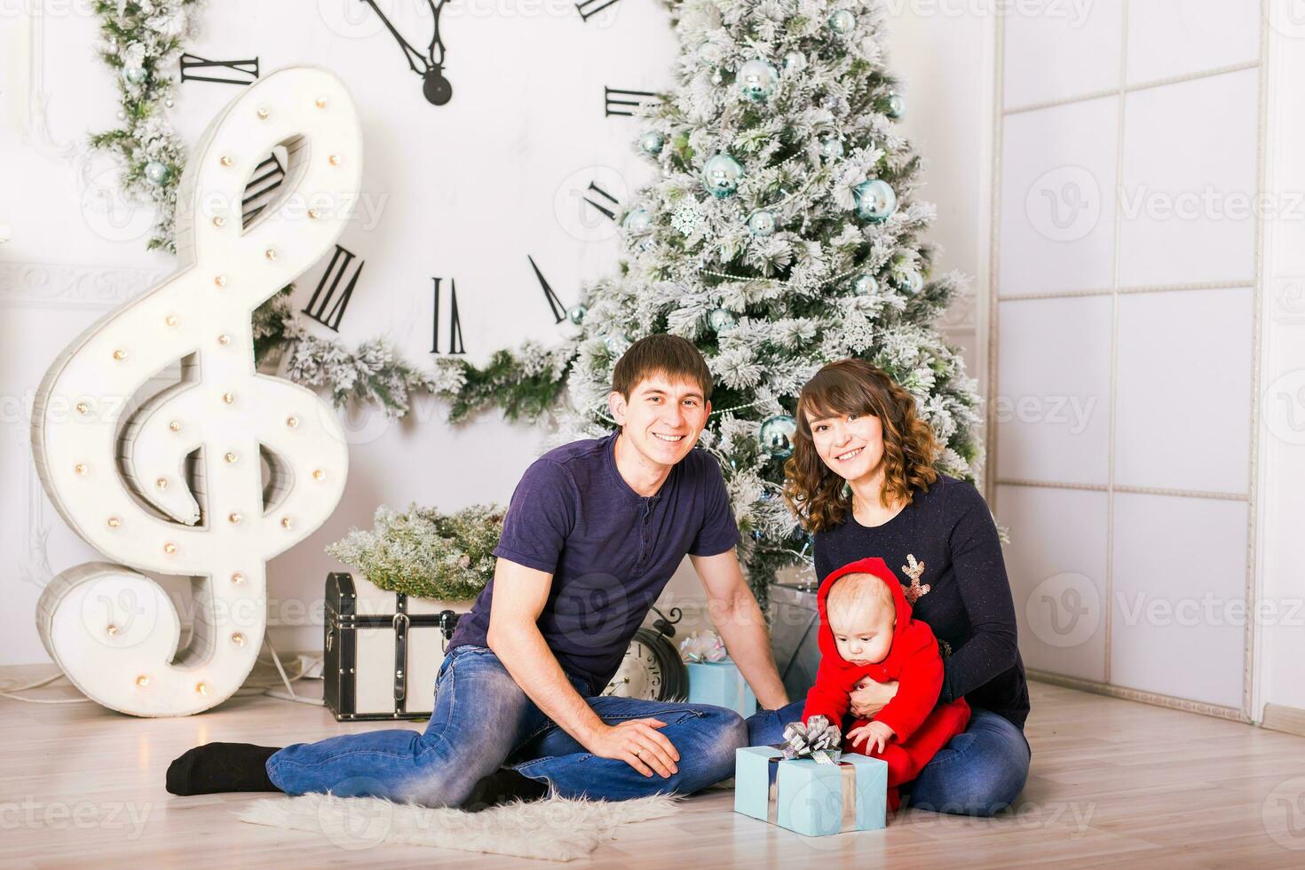 Christmas Family Portrait In Home Holiday Living Room, House Decorating By Xmas Tree photo