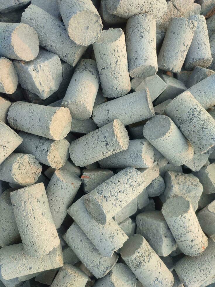 Solid Cylinder Concrete Blocks for building materials. photo
