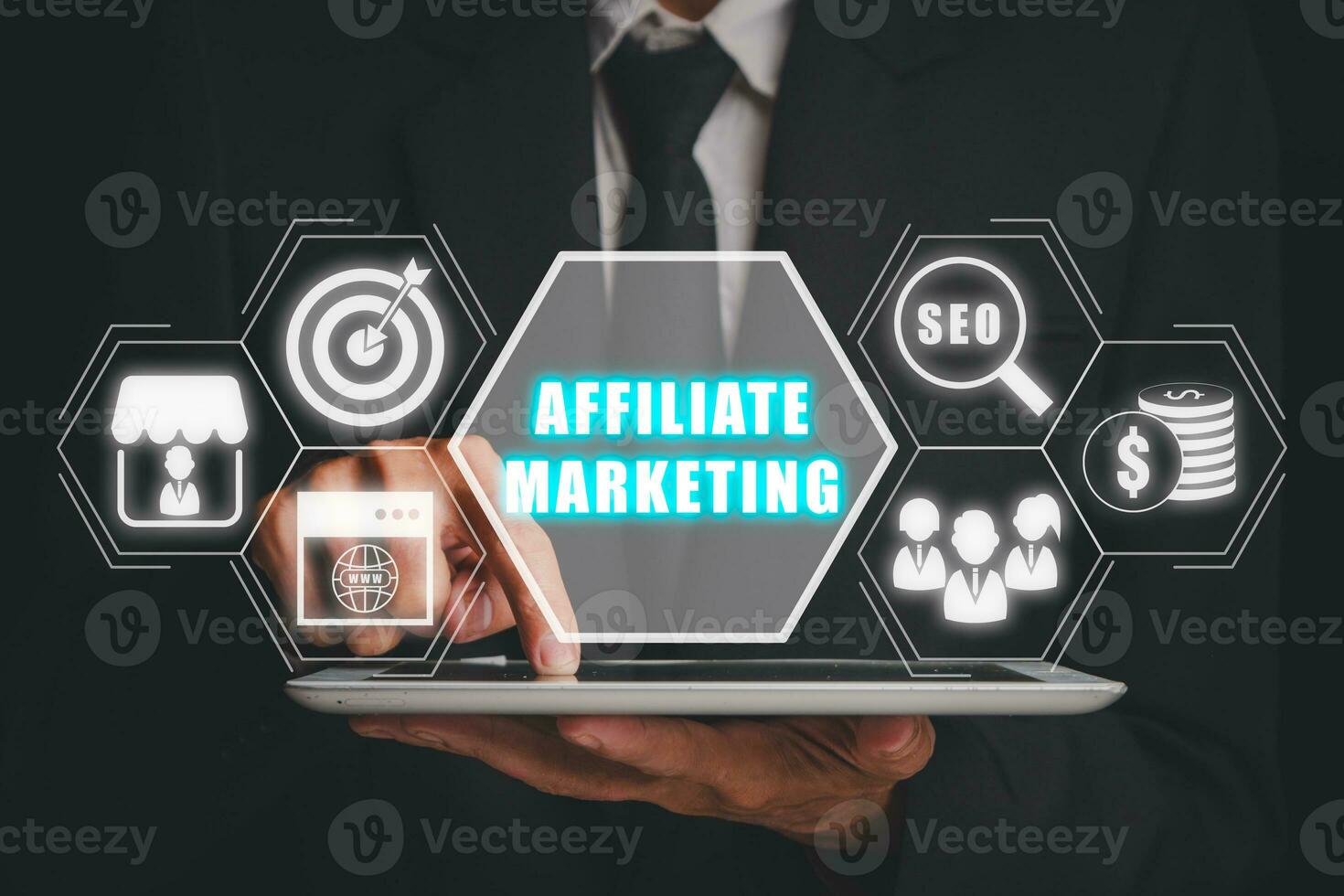 Affiliate marketing concept, Businessman working on tablet computer with affiliate marketing icon on virtual screen, Digital Marketing content planning advertising strategy. photo