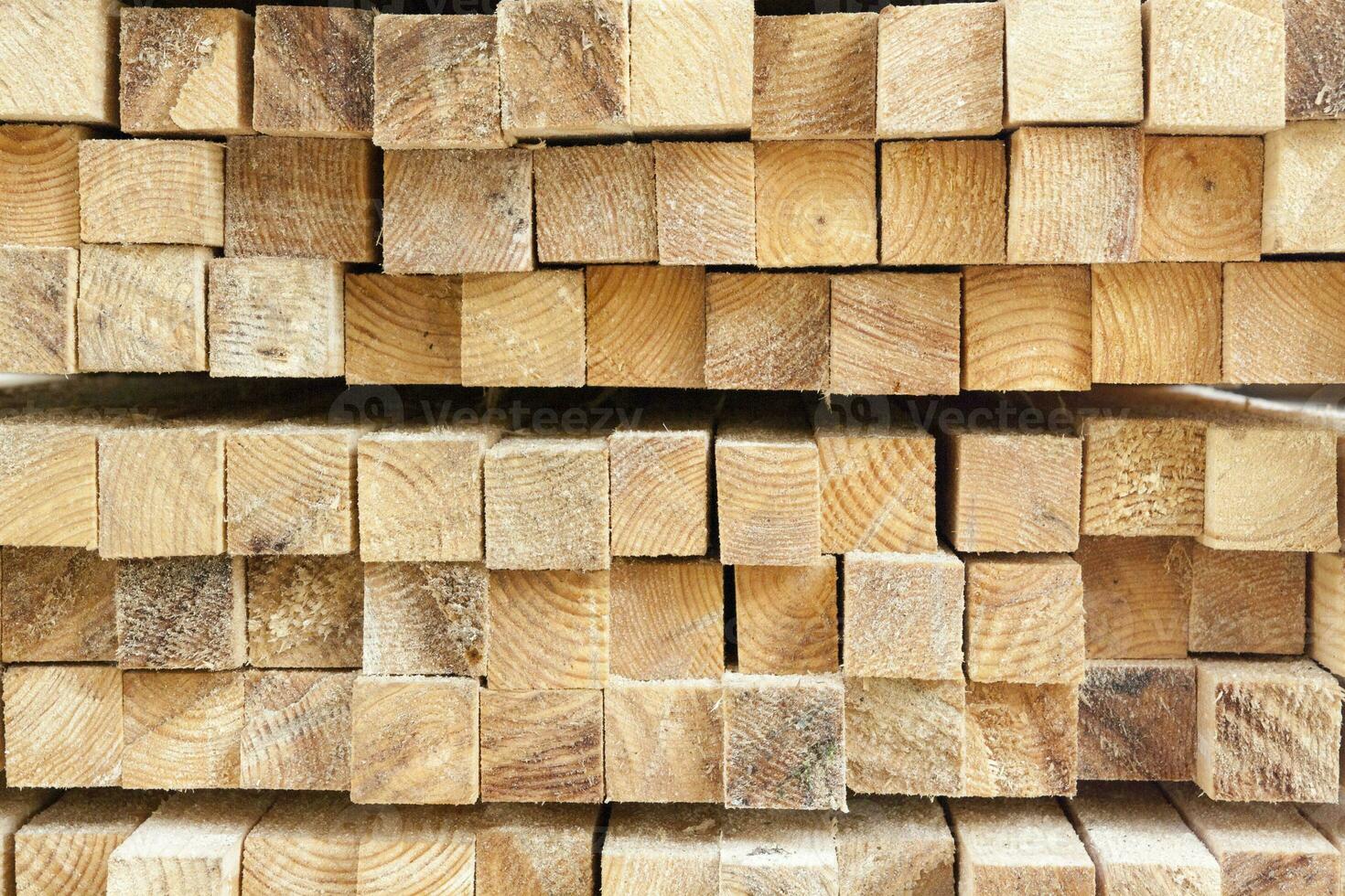 Wooden beam cut for construction. Lumber for wooden structures and frames photo