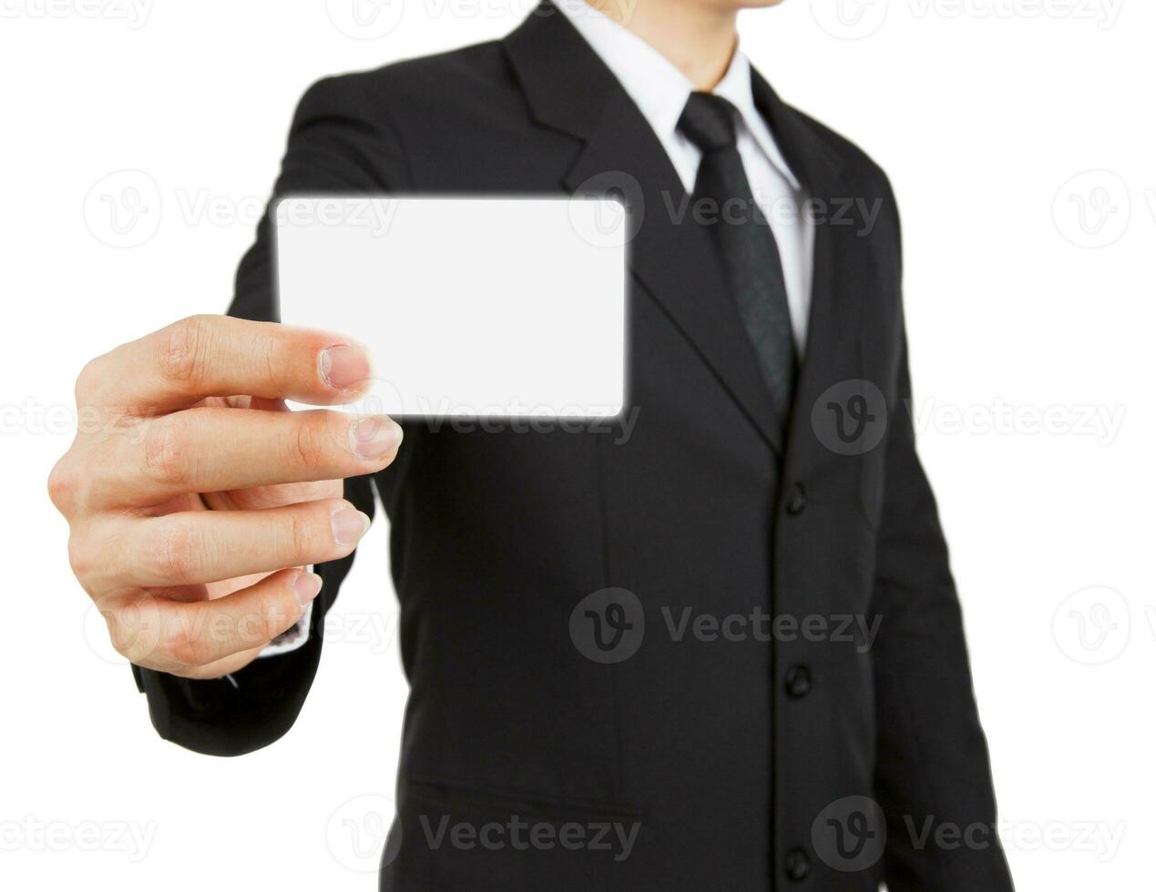Businessman holding paper or visit card isolated on white background. photo
