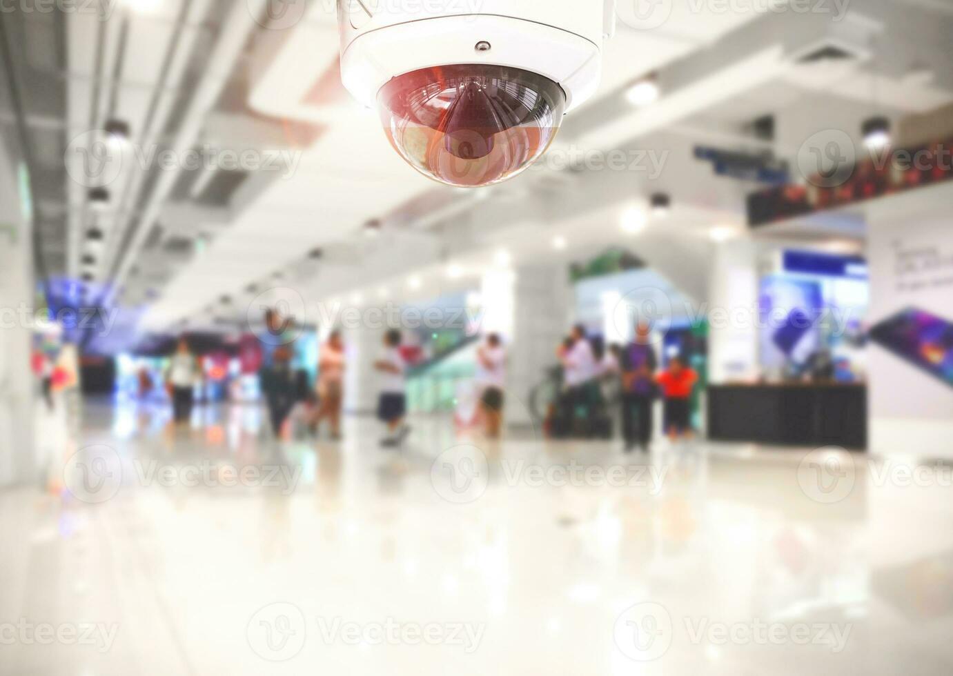 CCTV Security camera shopping department store on background. photo
