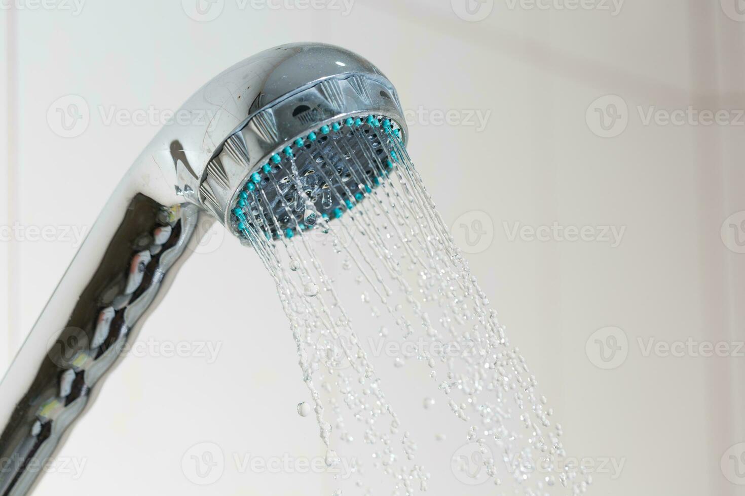 Shower with water steam in the bathroom. photo