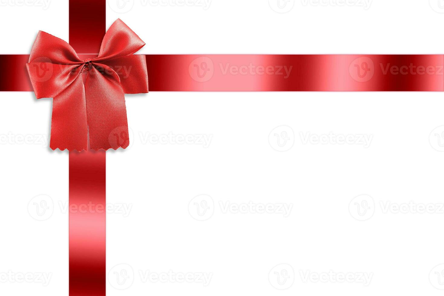 Beautiful red ribbon with gold bow isolated white background. photo