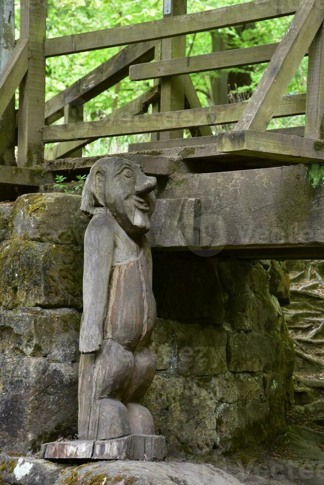 Large Carved Wooden Troll Under the Bridge in Littlebeck photo