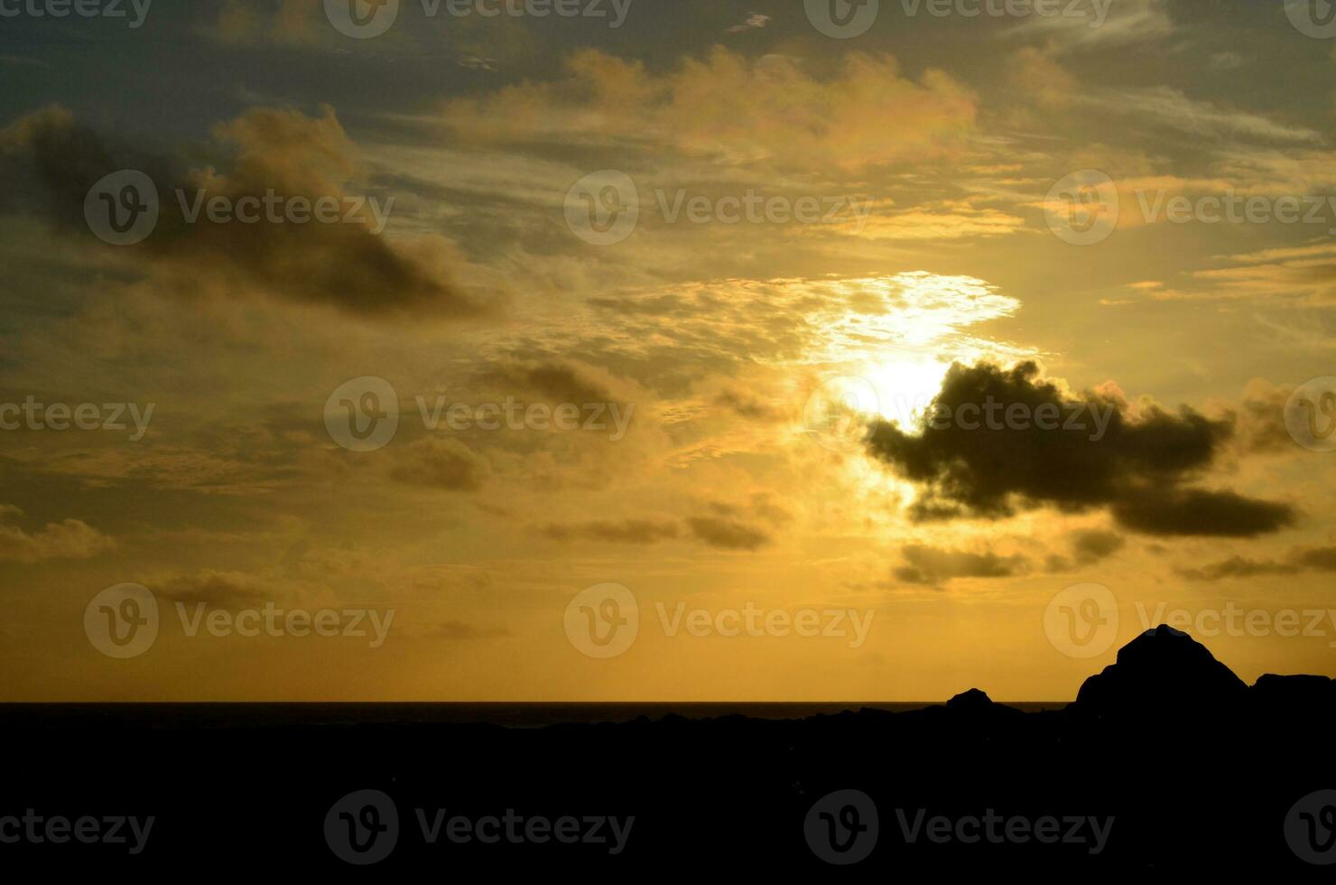 Stunning Sunrise Along the Coast with Lots of Clouds photo