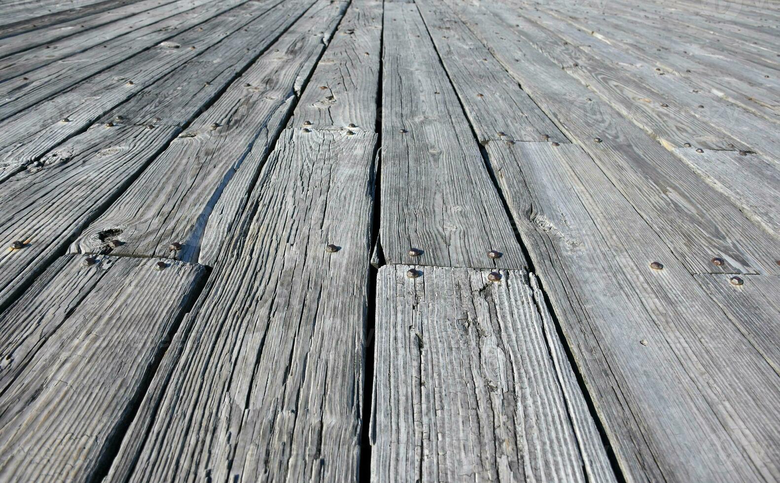 Grey Weathered Planks of an Old Dock photo