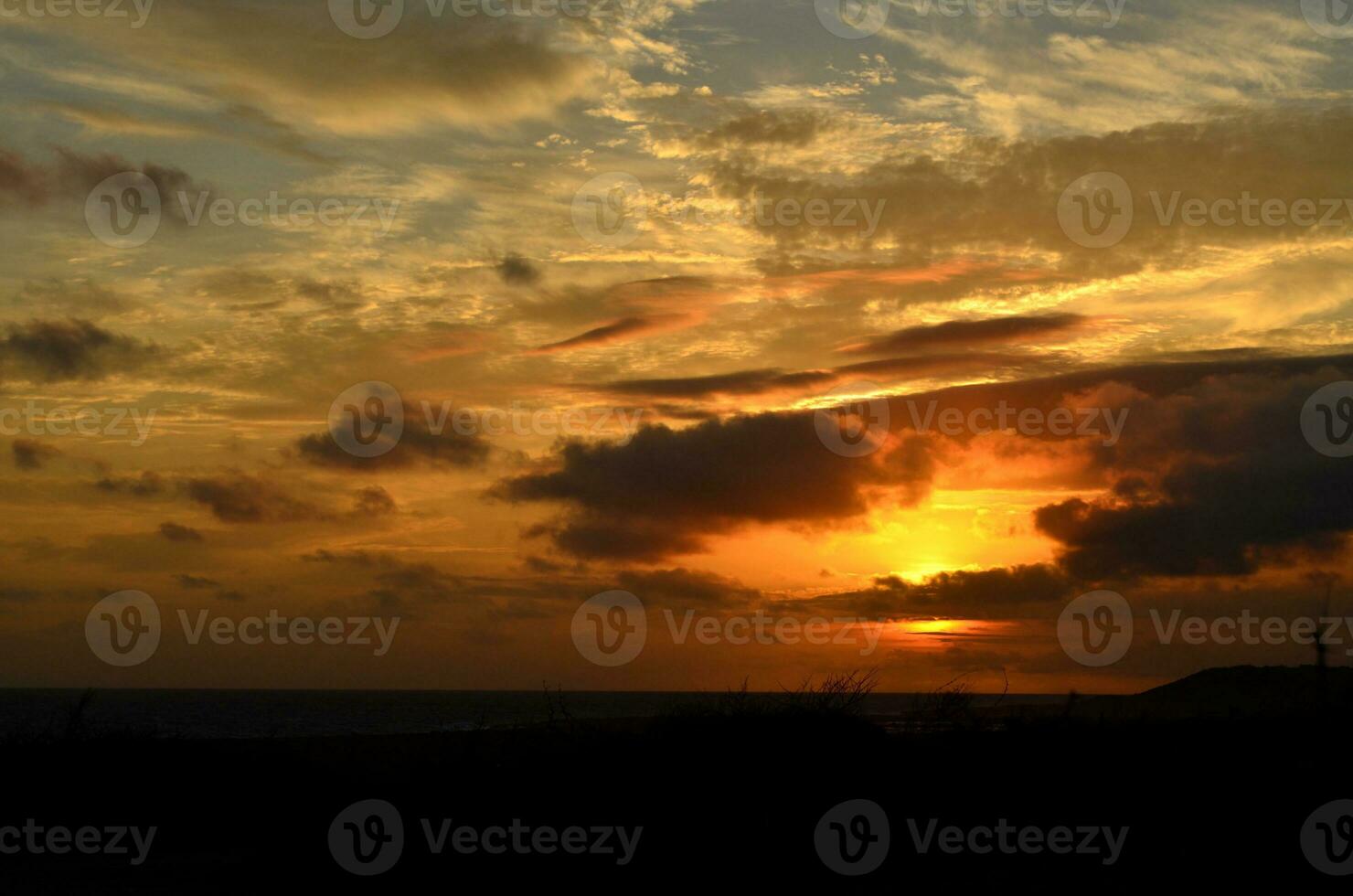 Breathtaking Skies Over the Ocean at Sunset photo