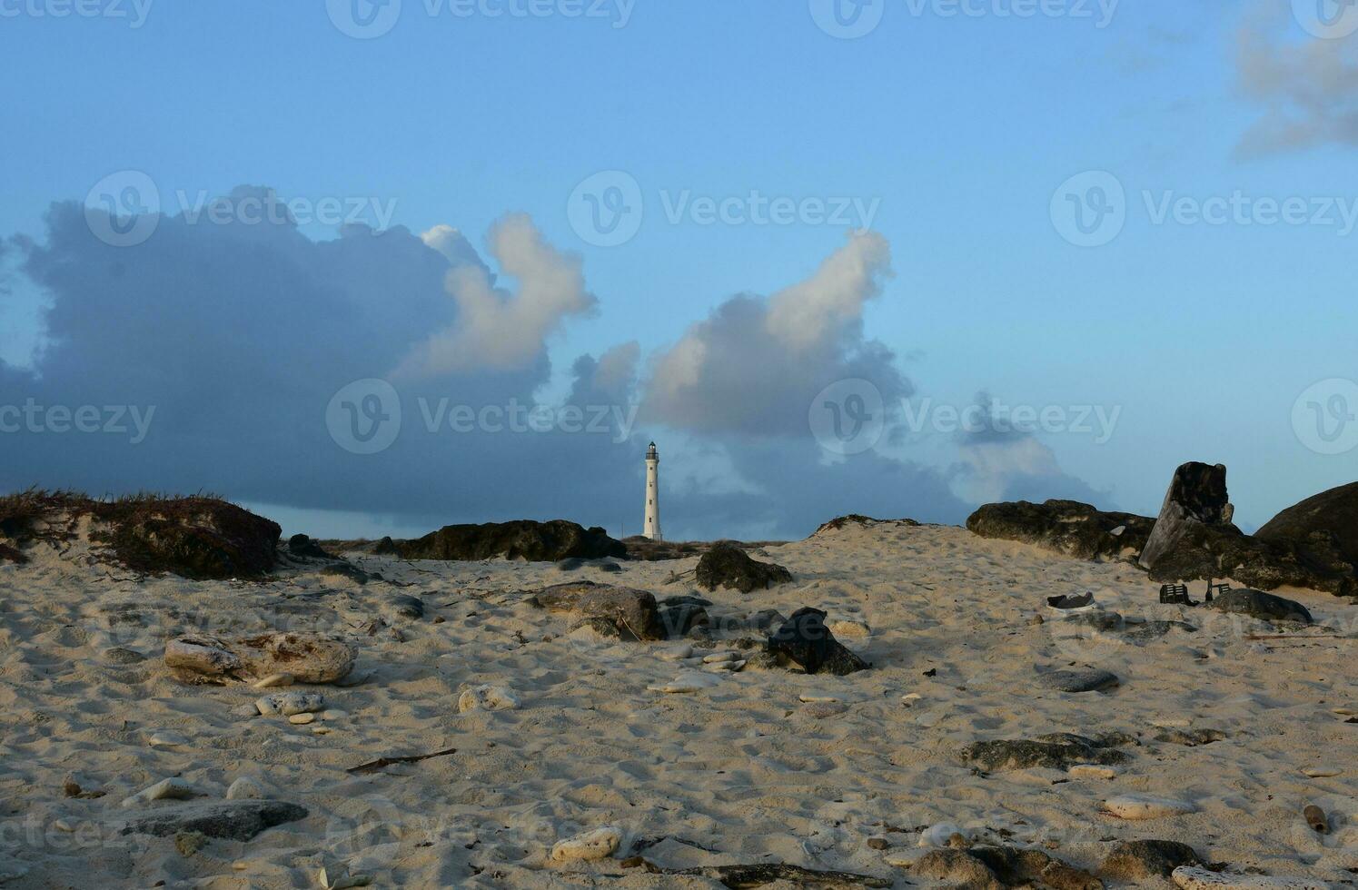 California Lighthouse in Aruba Surrounded by Sand photo