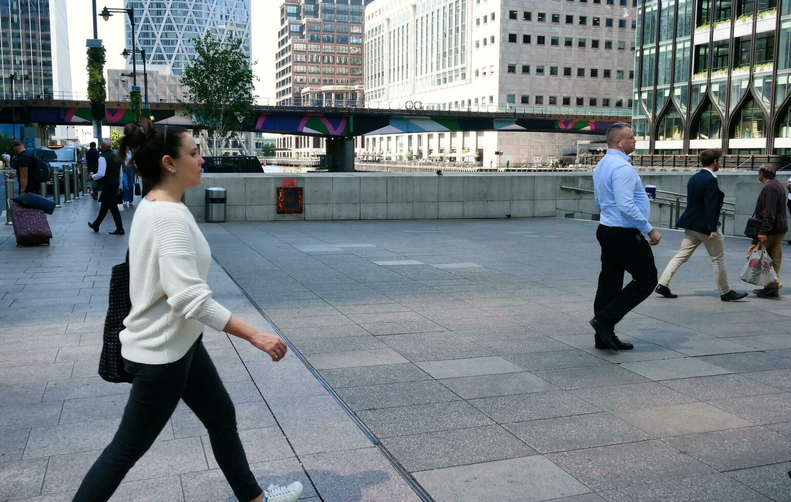 Beautiful View of People at Canary Wharf Central London City of England Great Britain of UK During a Bright Sunny Day. The Image Was Captured on June 08th, 2023 photo